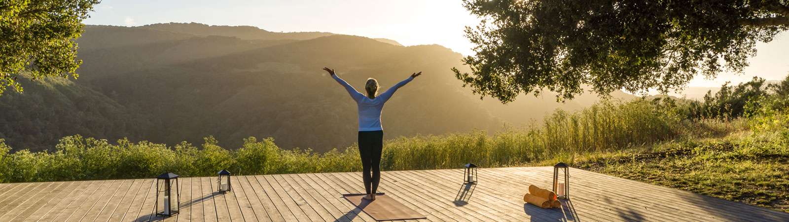 Yoga on deck with mountain view