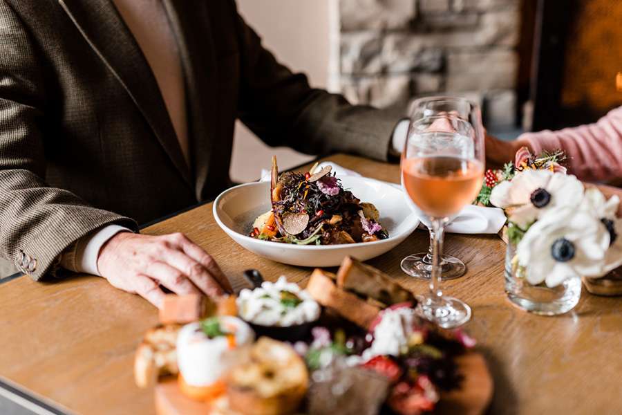 A couple with dinner spread at Valley Kitchen