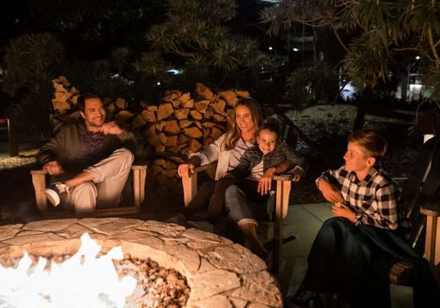 Couple around the campfire