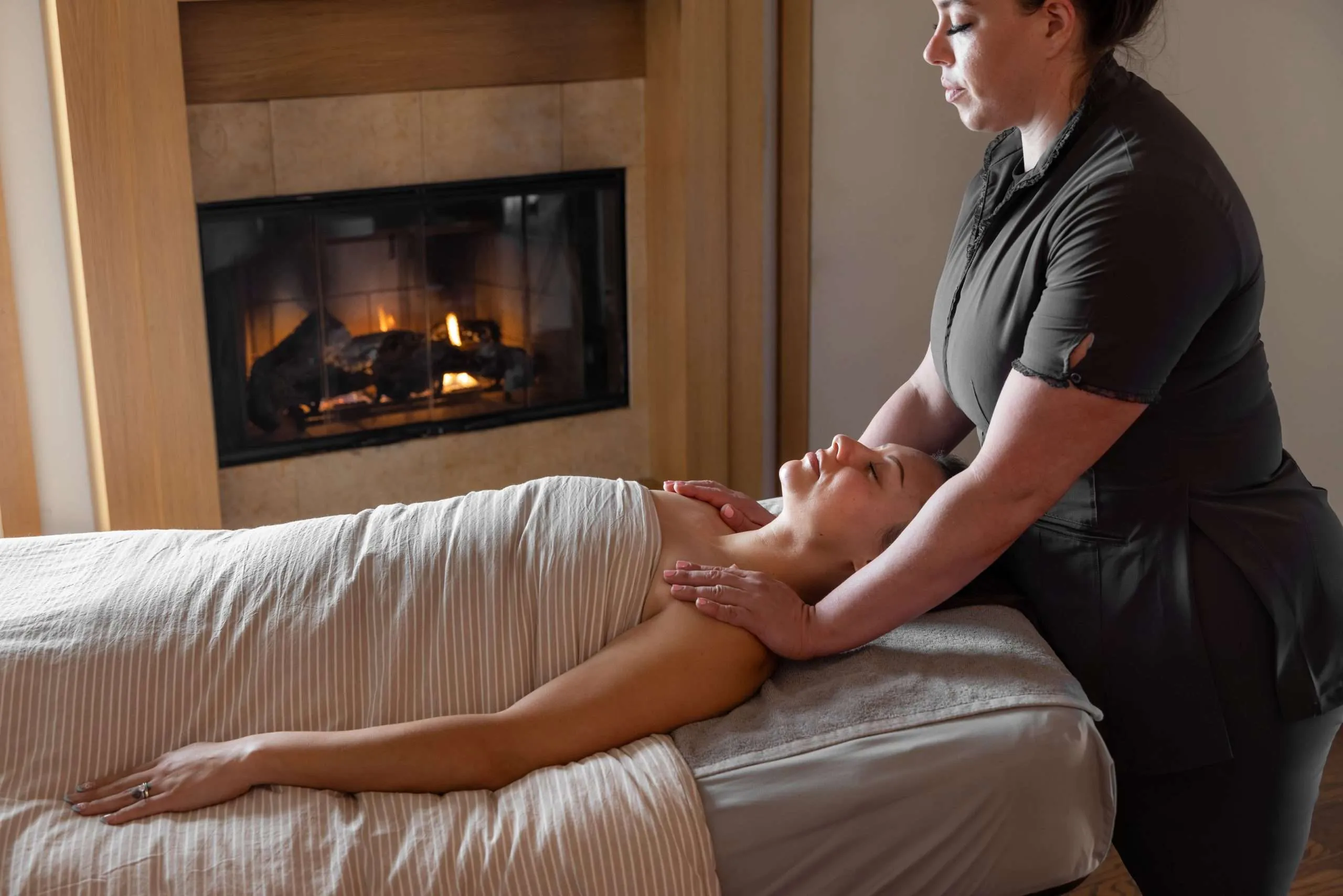 woman getting shoulder massage at spa aiyana